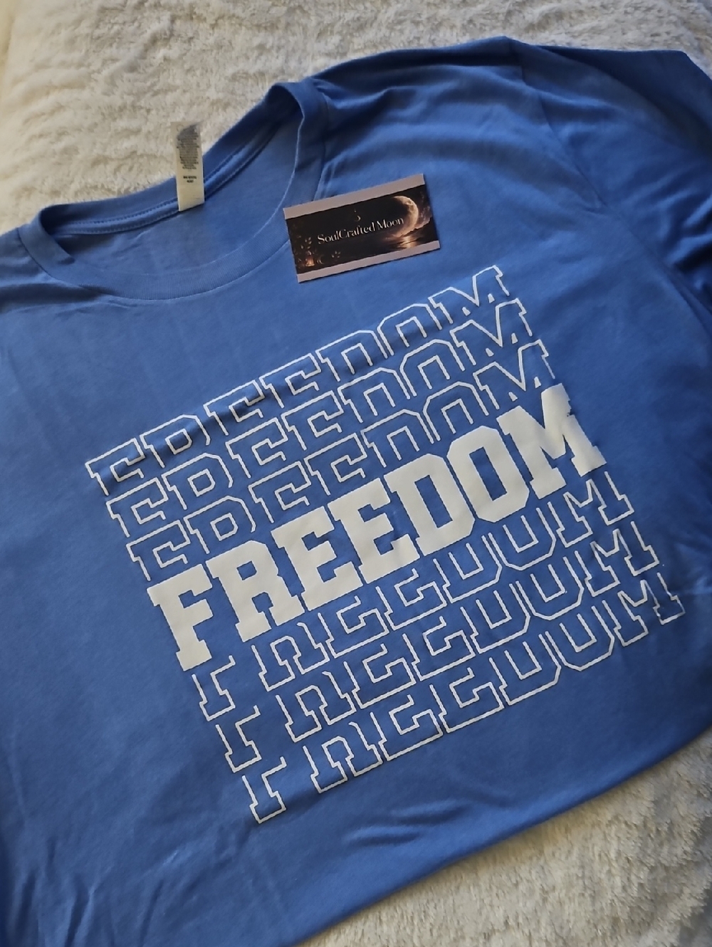 Bella Canvas Blue Short Sleeve Tee with White "FREEDOM" Graphic